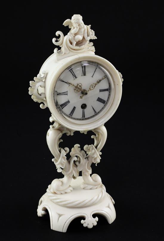 A 19th century French carved ivory boudoir timepiece, 6.5in.